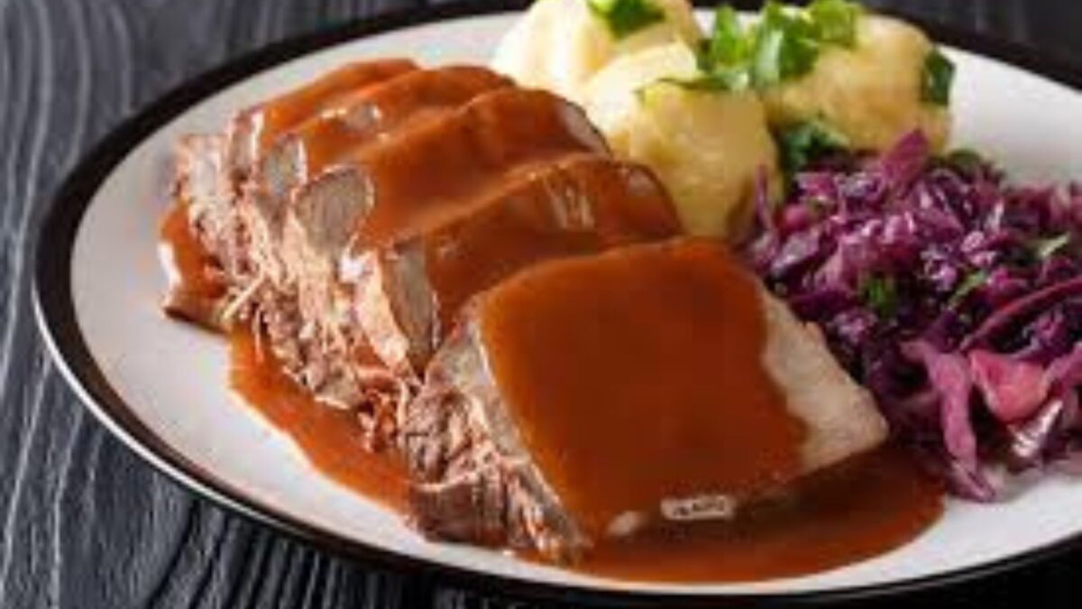 Traditional,German,Cuisine,,Schweinshaxe,Roasted,Ham,Hock.,Beer,,Pretzels,And